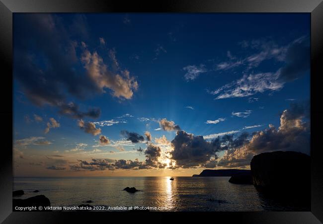 Sunset sky with dark clouds  Framed Print by Viktoriia Novokhatska