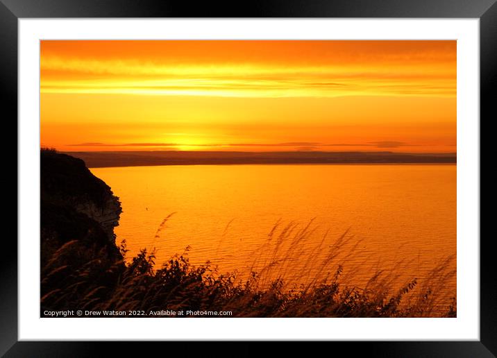 Sunset over the Yorkshire coast. Framed Mounted Print by Drew Watson