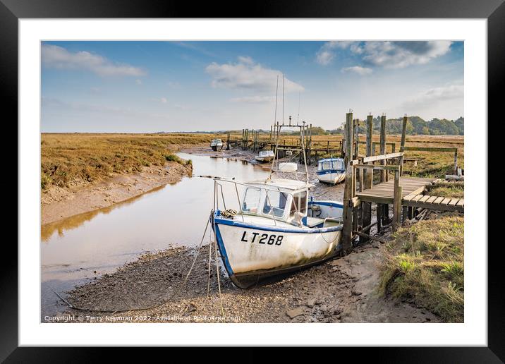 Serene Boats Basking in the Tranquil Thornham Harb Framed Mounted Print by Terry Newman