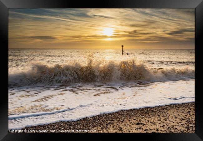 Sunrise over Dramatic Southwold Waves Framed Print by Terry Newman