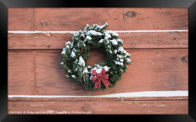 Christmas wreath with snow Framed Print by Philip Lehman