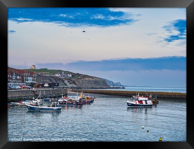 Folkestone Harbour and sea wall section Framed Print by Mike Hardy