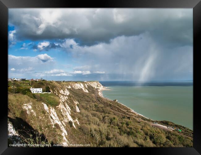White cliffs of Dover snowy storm clouds Framed Print by Mike Hardy