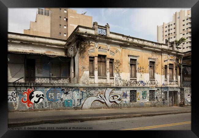 Graffiti on an old building in the heart of Sao Paulo, Brazil Framed Print by Gordon Dixon
