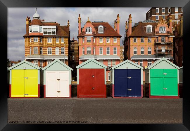 Five coloured beach huts on the Brighton seafront Framed Print by Gordon Dixon