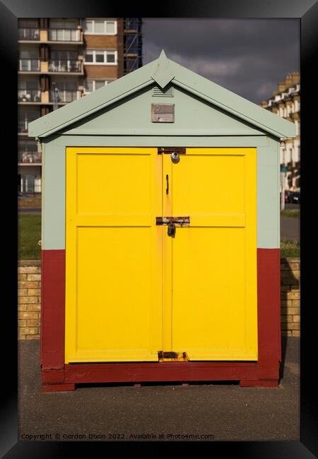 Yellow door of a beach hut on the esplanade, Brighton and Hove Framed Print by Gordon Dixon