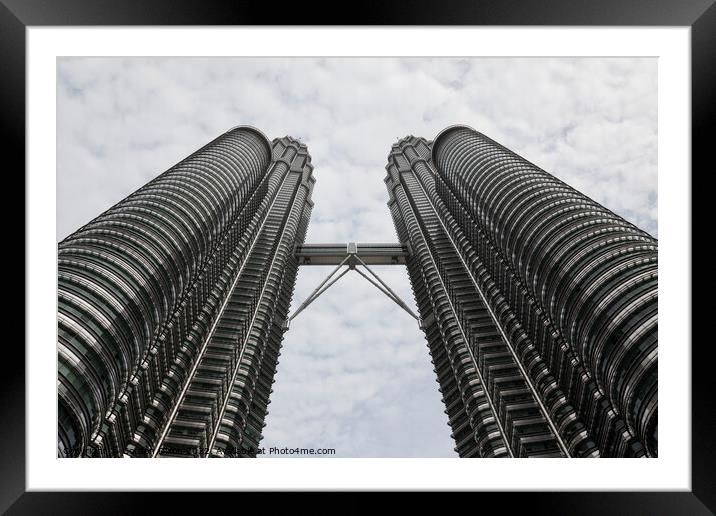 Looking up at the Petronas twin towers, Kuala Lumpur, Malaysia Framed Mounted Print by Gordon Dixon