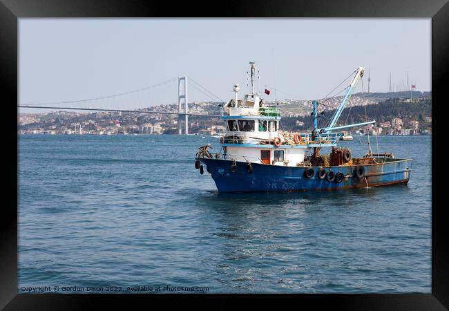 Fishing boat on the Bosphorus, Turkey Framed Print by Gordon Dixon