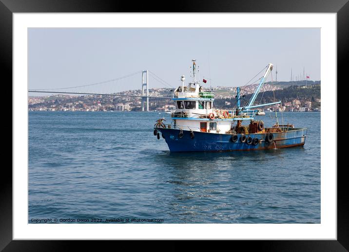 Fishing boat on the Bosphorus, Turkey Framed Mounted Print by Gordon Dixon