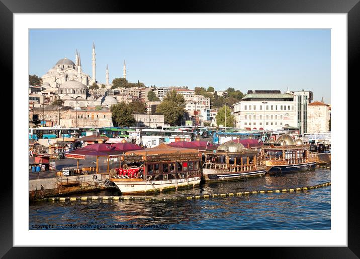 Suleymaniye Mosque and restaurant boats - Eminonu waterfront, Istanbul Framed Mounted Print by Gordon Dixon