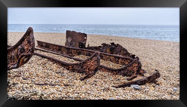 Rusting hull on Chesil beach - Dorset Framed Print by Gordon Dixon