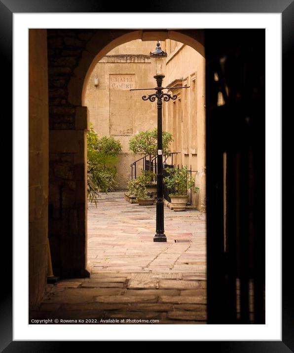 Looking into the Hospital of St John the Baptist through an Arch Gate Framed Mounted Print by Rowena Ko