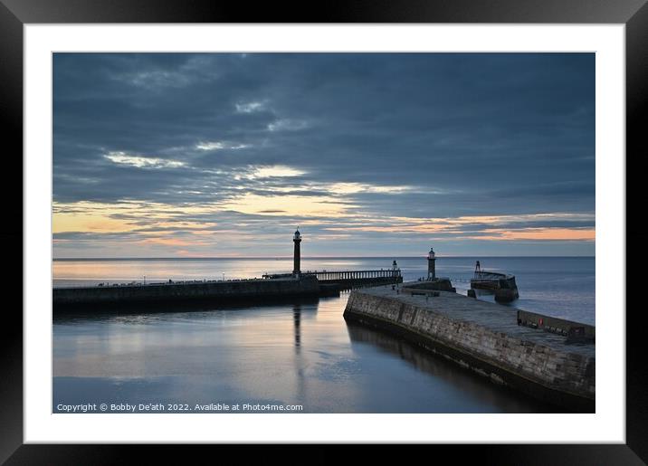 Whitby piers in the evening light Framed Mounted Print by Bobby De'ath