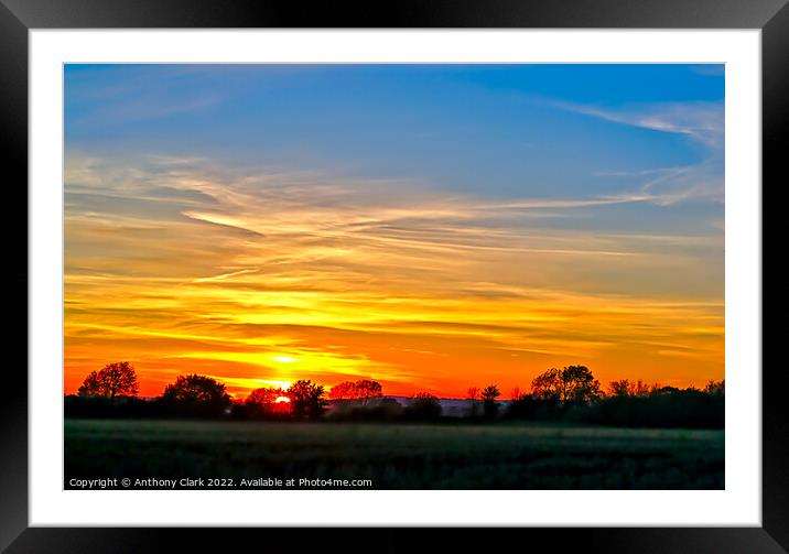 A view of a sunset Framed Mounted Print by Anthony Clark