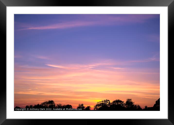 Clouds at sunset Framed Mounted Print by Anthony Clark