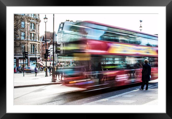 London Bus in motion Framed Mounted Print by Daniel Gwalter