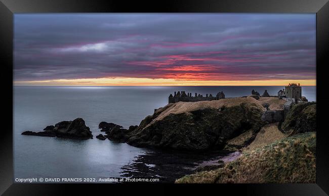 A Majestic Sunset over Dunnottar Castle Framed Print by DAVID FRANCIS