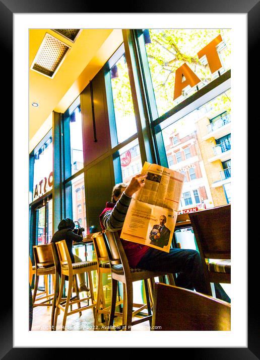 Man reading The Financial Times in a Costa coffee shop Framed Mounted Print by Rose Sicily