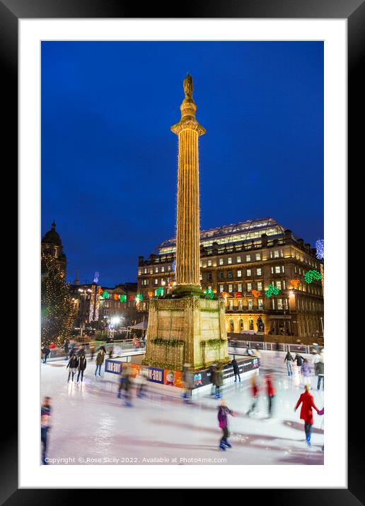 Ice skating at the Christmas funfair George Square Glasgow Scotland UK Framed Mounted Print by Rose Sicily