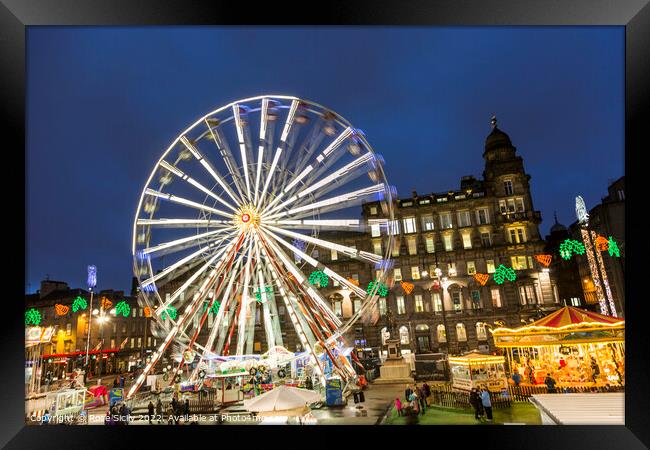 Ferris wheel at the Christmas funfair George Square Glasgow Scotland UK Framed Print by Rose Sicily