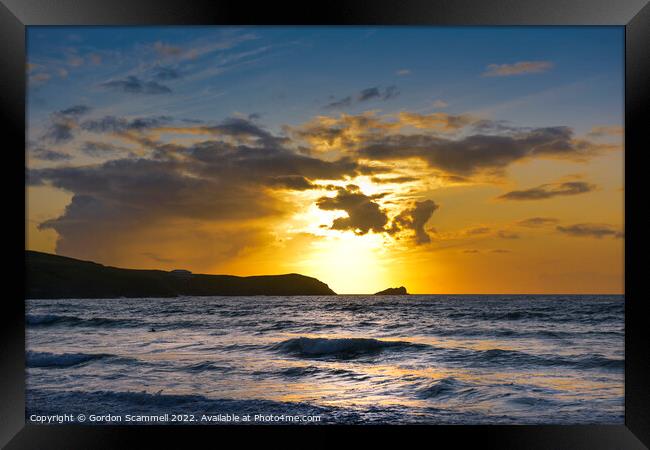A beautiful intense sunset over Fistral Bay in New Framed Print by Gordon Scammell
