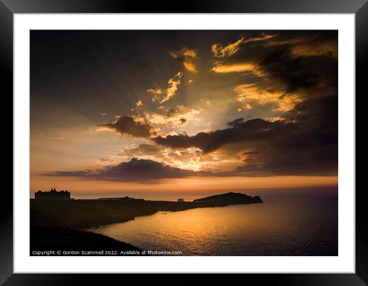 A dramatic sunset over Towan Head in Newquay Framed Mounted Print by Gordon Scammell
