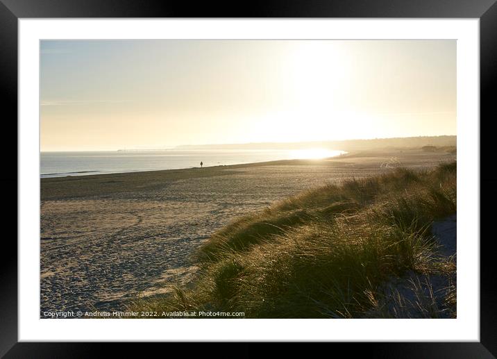 Solitary walk on the beach Framed Mounted Print by Andreas Himmler