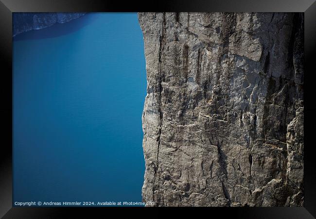 600 m high vertical cliff from Preikestolen down to the Lysefjor Framed Print by Andreas Himmler