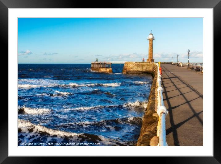 Whitby Lighthouse and Pier Yorkshire. Framed Mounted Print by Craig Yates