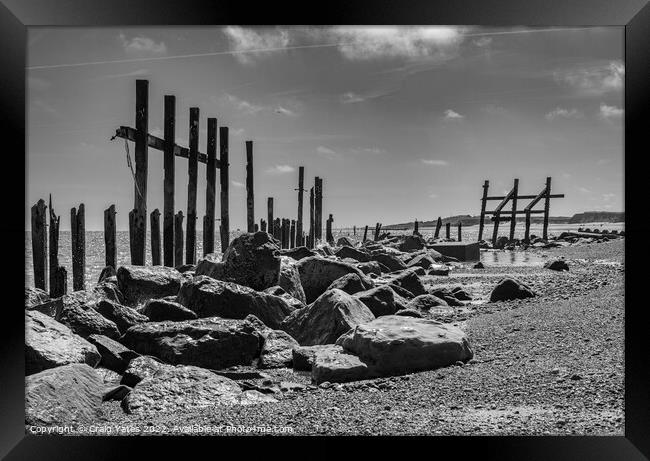 Happisburgh wooden sea defences black and white. Framed Print by Craig Yates