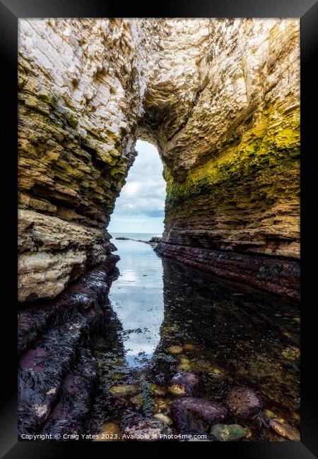 Selwicks Bay Rock Arch. Flamborough Head. Framed Print by Craig Yates