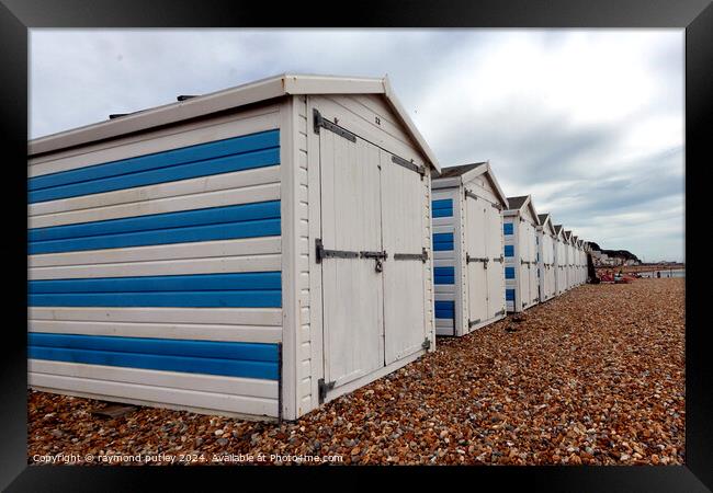 Hastings Seafront - Beach Huts Framed Print by Ray Putley