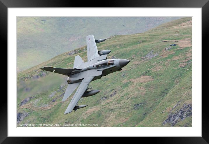 Tornado GR4 is a highly capable frontline aircraft, iconic for its impressive swing role capabilities. Framed Mounted Print by Brett Pearson