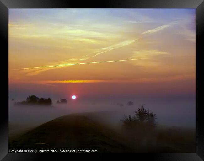 Sun Rising Above Morning Haze Framed Print by Maciej Czuchra