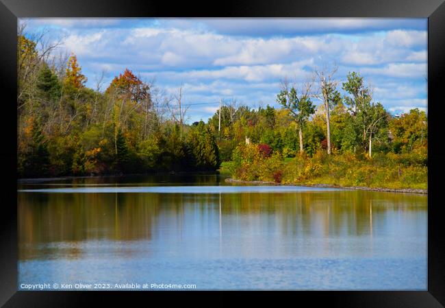 Autumn splendor along the Riverbank Framed Print by Ken Oliver