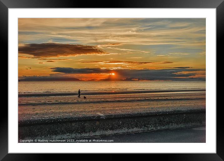 A sunset from a beach Framed Mounted Print by Rodney Hutchinson