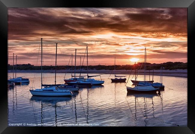 Serene Sunset over Beadnell Bay Framed Print by Rodney Hutchinson