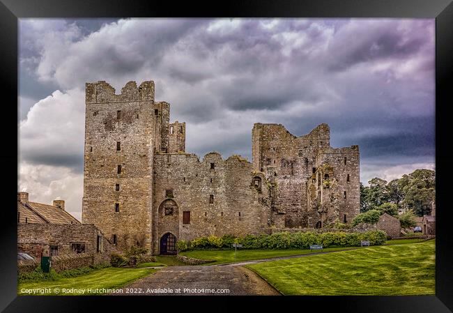 Majestic Bolton Castle on a gloomy day Framed Print by Rodney Hutchinson