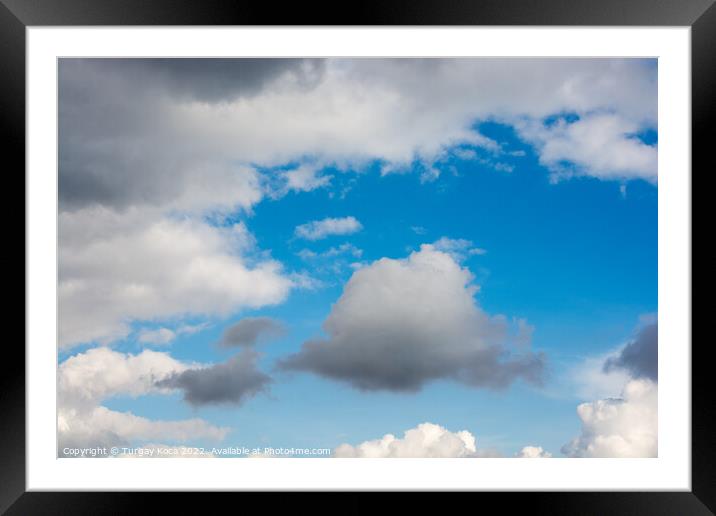 White color clouds found in the  blue sky Framed Mounted Print by Turgay Koca