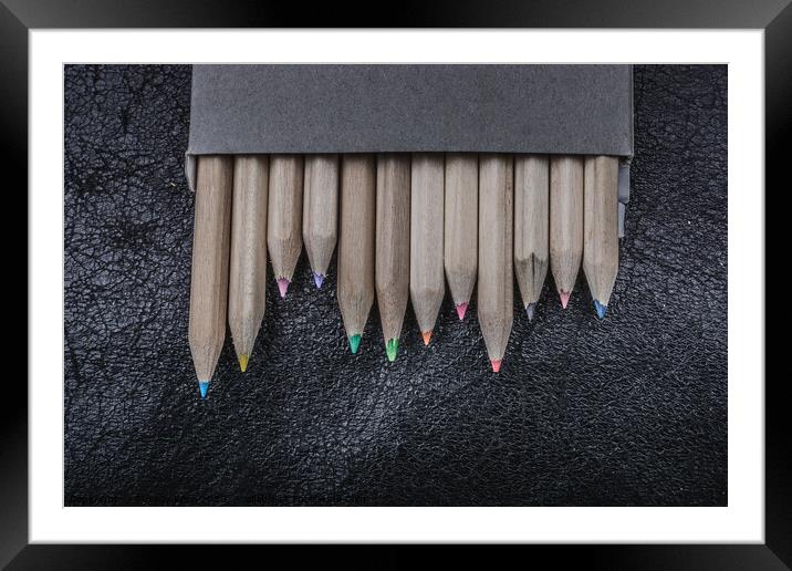 Colored pencils for creative idea and concept. Drawing and paint Framed Mounted Print by Turgay Koca