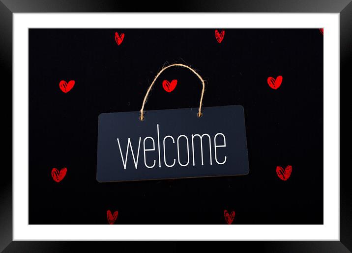 Welcome on black notice board  with red hearts around Framed Mounted Print by Turgay Koca