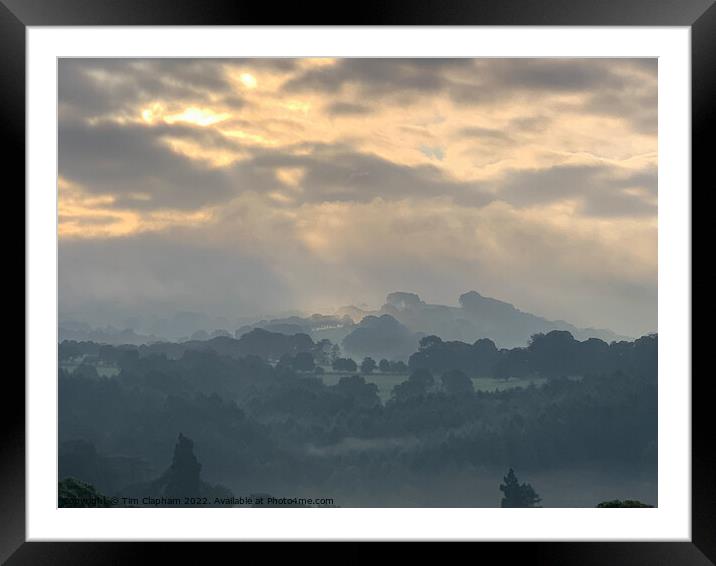 Amazing sky over a misty morning Framed Mounted Print by Tim Clapham