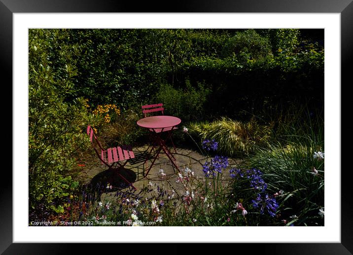 Floral Garden with a Rustic Iron Table and Chairs. Framed Mounted Print by Steve Gill