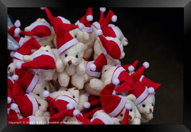Stack of Adorable Teddy Bears Wearing Father Christmas Hats. Framed Print by Steve Gill