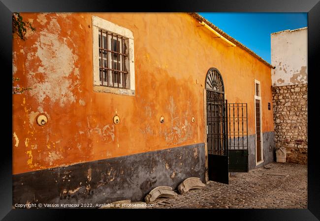 Colourful old building in Faro Portugal Framed Print by Vassos Kyriacou