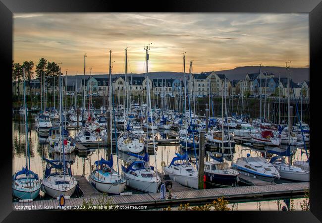 Sunsets on Inverkip Marina Framed Print by RJW Images