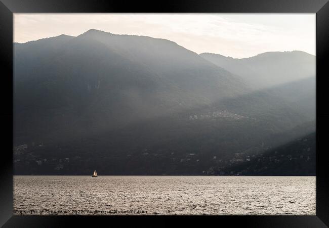 Boat in the middle of Lake Como Italy  Framed Print by Simo Wave