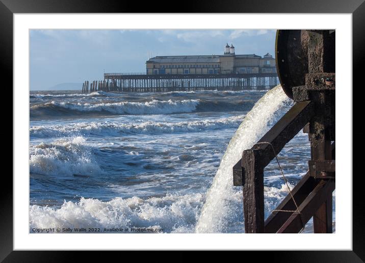 Surf breaking by Hastings Pier Framed Mounted Print by Sally Wallis