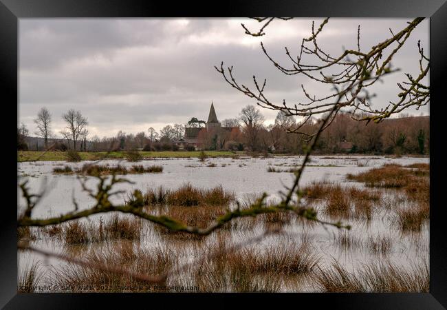 Alfriston church across floods Framed Print by Sally Wallis