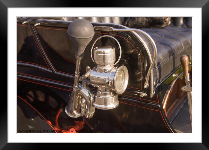 Lamp & horn on a Veteran motorcar Framed Mounted Print by Sally Wallis